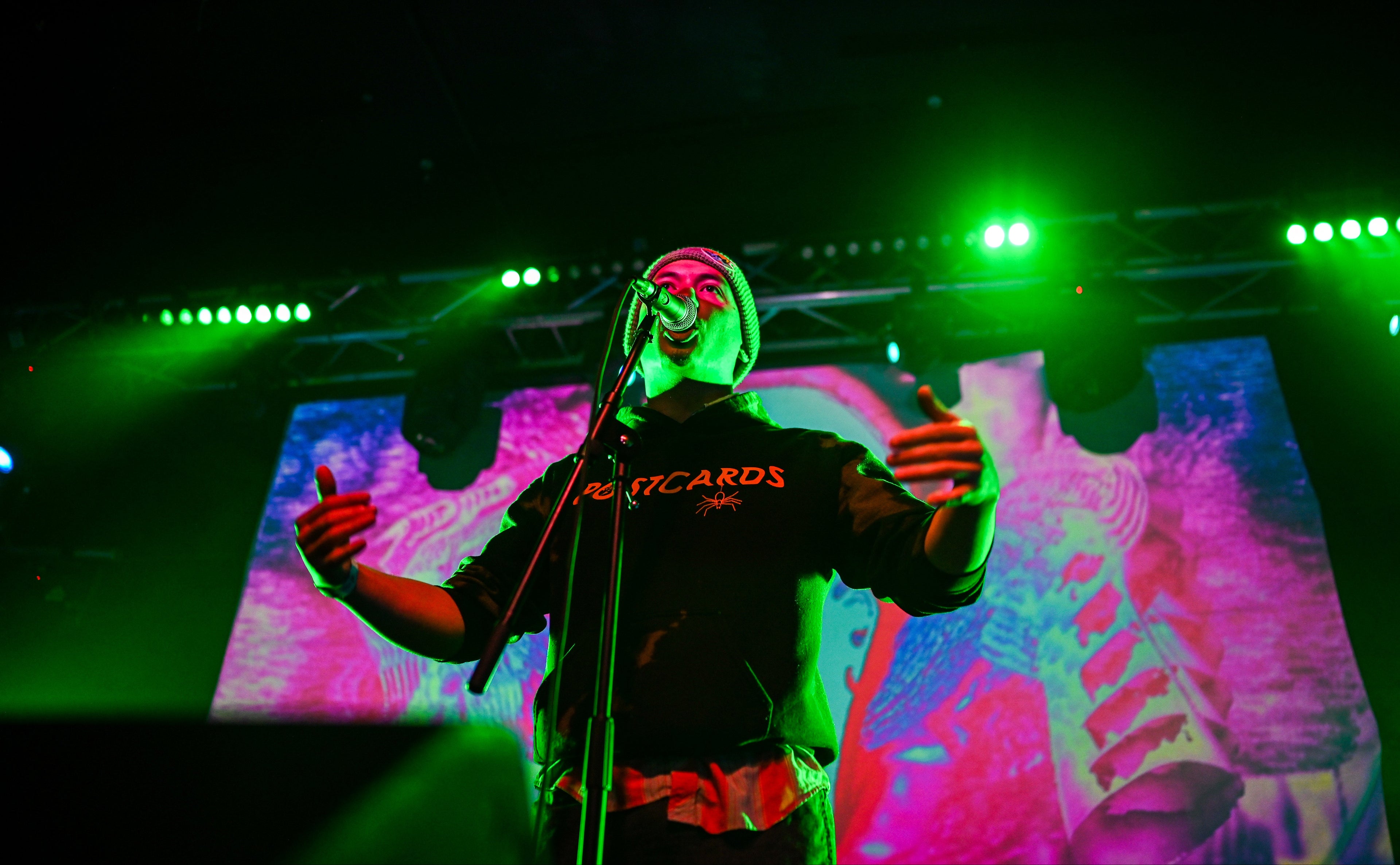 B. Boyd on stage with a microphone.
Photo by John Bellipanni